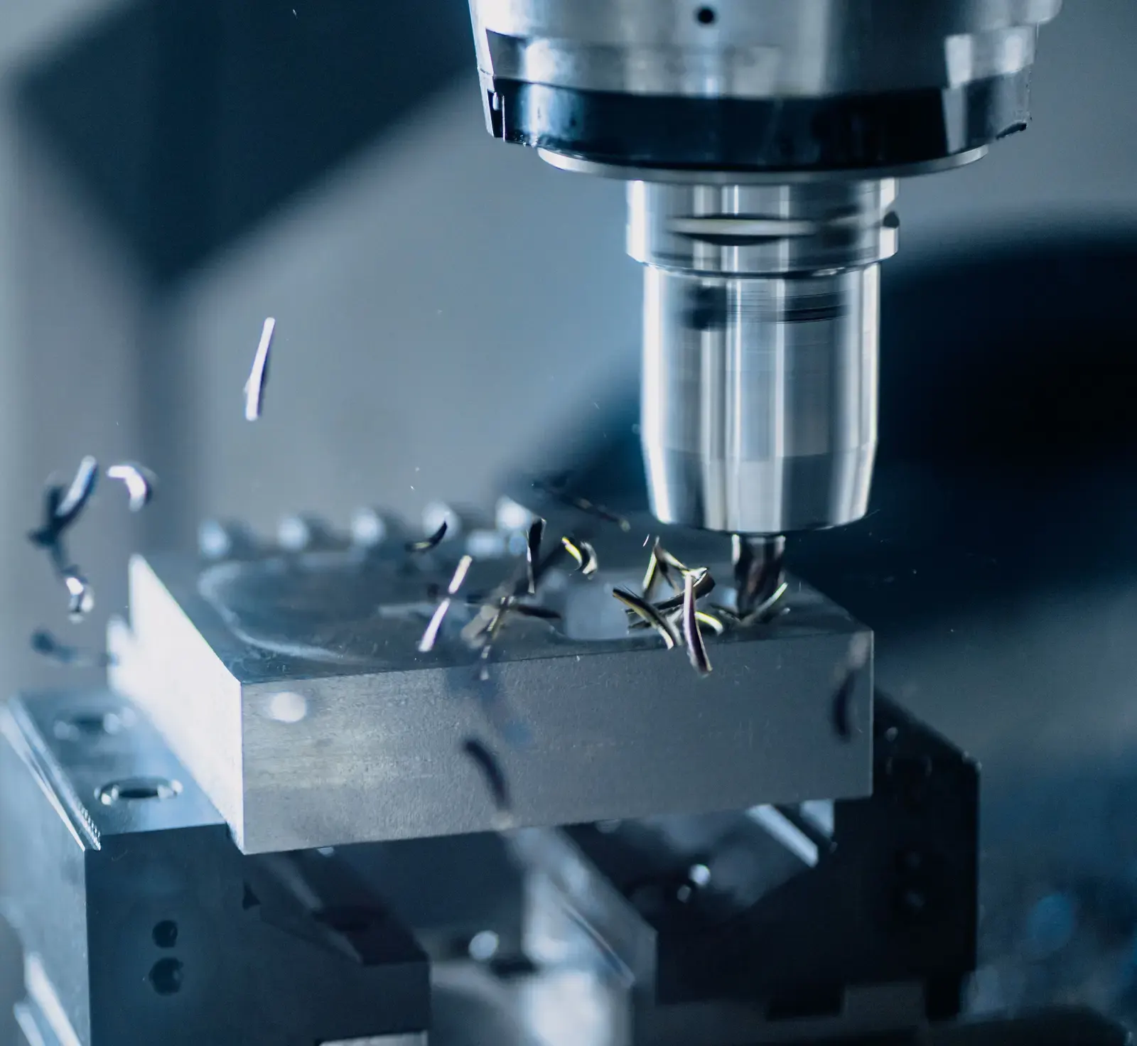 CNC milling cutter machining a metal component